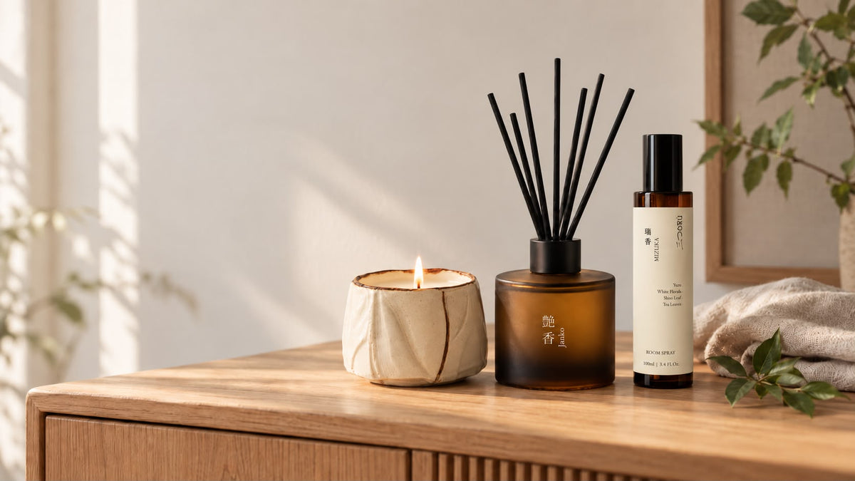 Mittsu Doru candle, JANKO reed diffuser and MIZUKA room spray on an oak sideboard in soft morning light