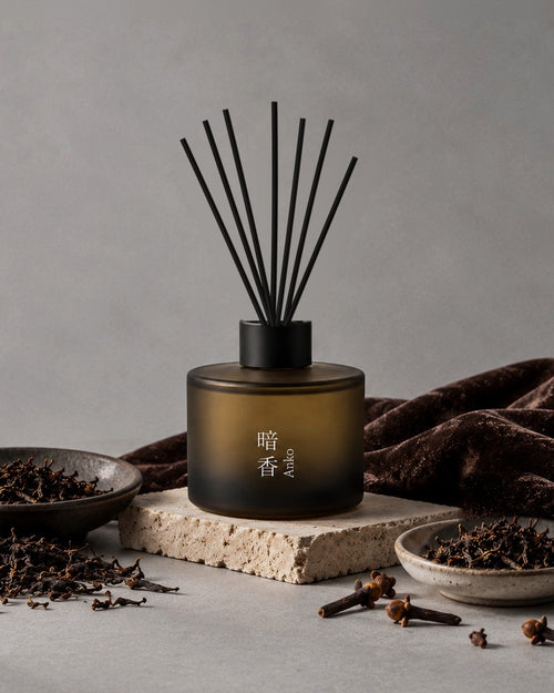 ANKO reed diffuser by Mittsu Doru styled with its scent notes – black tea leaves, whole cloves and dark velvet