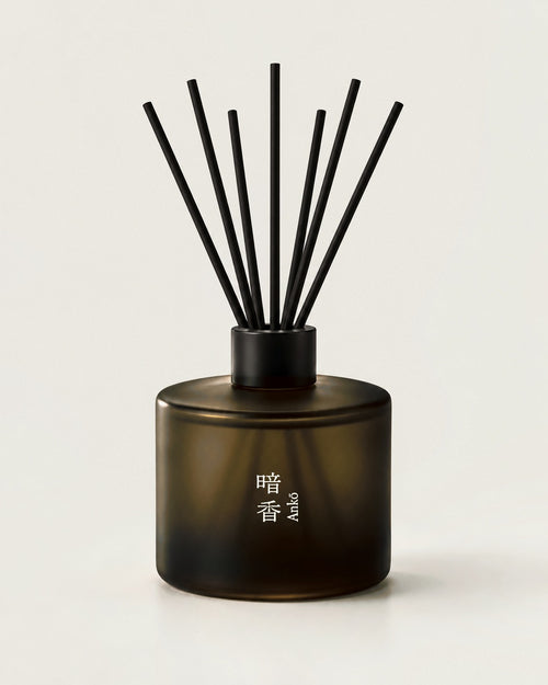 ANKO reed diffuser by Mittsu Doru – frosted amber bottle with black cap and 7 black reeds