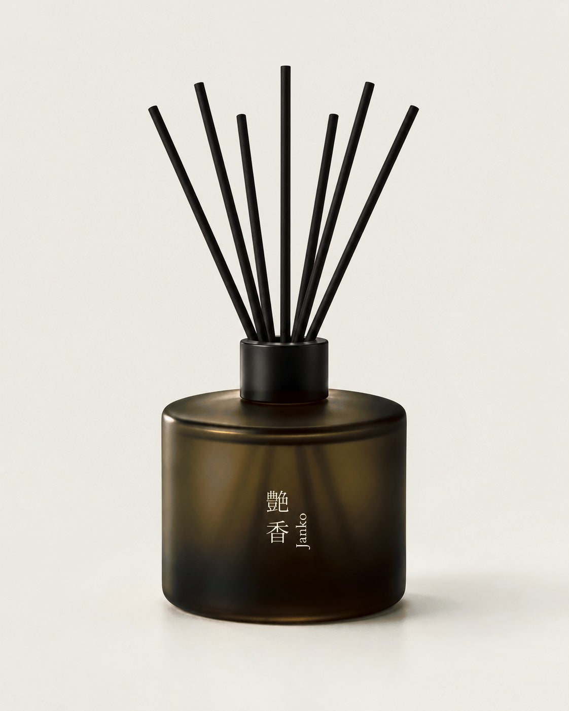 JANKO reed diffuser by Mittsu Doru – frosted amber bottle with black cap and 7 black reeds
