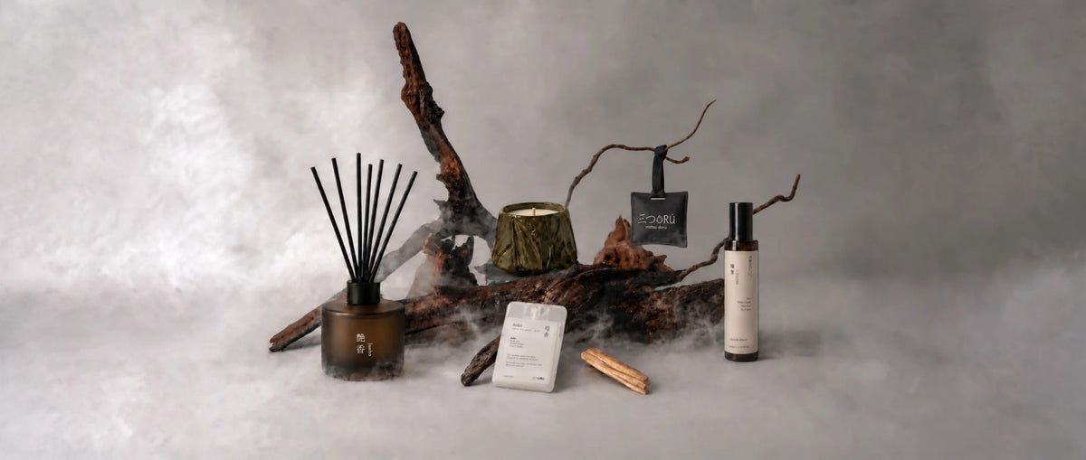 Mittsu Doru reed diffuser, candle, scent tag, room spray and pocket mist on driftwood